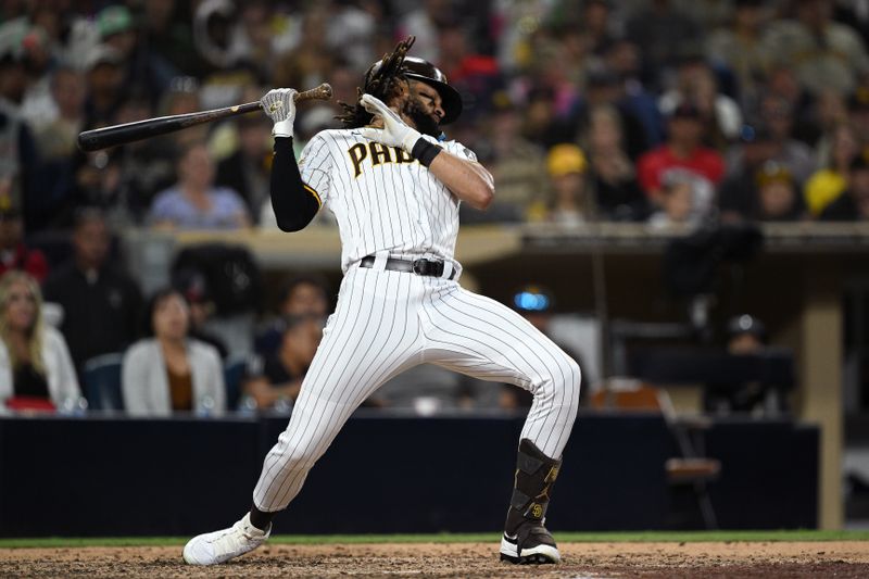 Jun 15, 2023; San Diego, California, USA; San Diego Padres right fielder Fernando Tatis Jr. (23) reacts to an inside pitch during the eighth inning against the Cleveland Guardians at Petco Park. Mandatory Credit: Orlando Ramirez-USA TODAY Sports