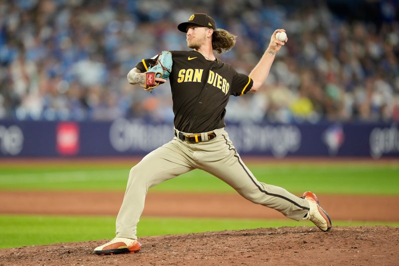 Jul 19, 2023; Toronto, Ontario, CAN; San Diego Padres pitcher Josh Hader (71) pitches to the Toronto Blue Jays during the ninth inning at Rogers Centre. Mandatory Credit: John E. Sokolowski-USA TODAY Sports