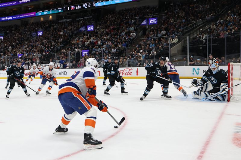 Nov 14, 2025; Salt Lake City, Utah, USA; New York Islanders left wing Jonathan Drouin (29) looks for a play against the Utah Mammoth during the second period at Delta Center. Mandatory Credit: Rob Gray-Imagn Images