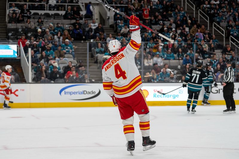 Dec 16, 2025; San Jose, California, USA; Calgary Flames defenseman Rasmus Andersson (4) celebrates after the goal against the San Jose Sharks during the first period at SAP Center at San Jose. Mandatory Credit: Neville E. Guard-Imagn Images
