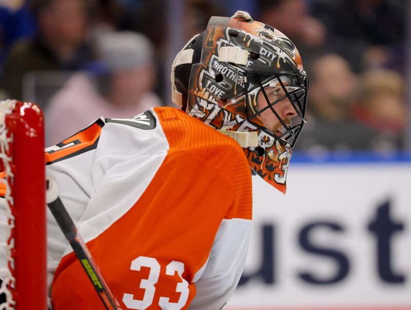 Nov 3, 2023; Buffalo, New York, USA;  Philadelphia Flyers goaltender Samuel Ersson (33) watches the play during the second period against the Buffalo Sabres at KeyBank Center. Mandatory Credit: Timothy T. Ludwig-USA TODAY Sports