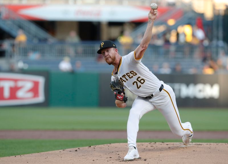 Sep 5, 2024; Pittsburgh, Pennsylvania, USA;  Pittsburgh Pirates starting pitcher Bailey Falter (26) delivers a pitch against the Washington Nationals during the first inning at PNC Park. Mandatory Credit: Charles LeClaire-Imagn Images