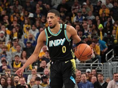 INDIANAPOLIS, IN - DECEMBER 23:  Tyrese Haliburton #0 of the Indiana Pacers handles the ball during the game against the Orlando Magic on December 23, 2023 at Gainbridge Fieldhouse in Indianapolis, Indiana. NOTE TO USER: User expressly acknowledges and agrees that, by downloading and or using this Photograph, user is consenting to the terms and conditions of the Getty Images License Agreement. Mandatory Copyright Notice: Copyright 2023 NBAE (Photo by Pepper Robinson/NBAE via Getty Images)