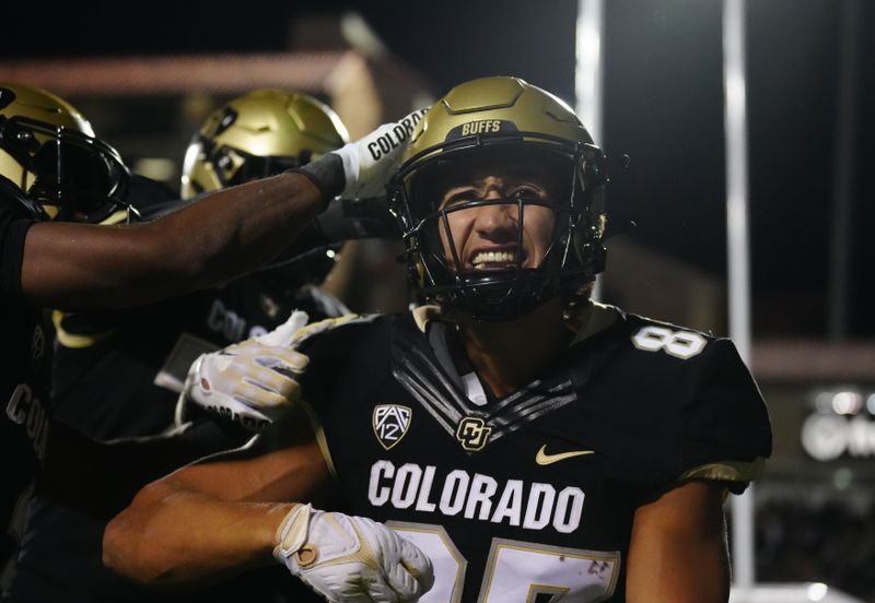 Sep 16, 2023; Boulder, Colorado, USA; Colorado Buffaloes tight end Michael Harrison (87) celebrates his two point conversion in the fourth quarter against the Colorado State Rams at Folsom Field. Mandatory Credit: Ron Chenoy-USA TODAY Sports