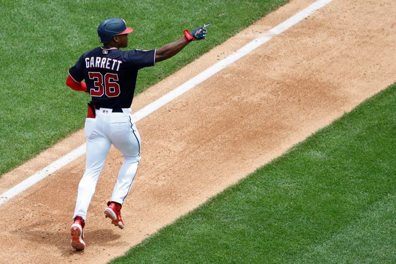 Jul 9, 2023; Washington, District of Columbia, USA; Washington Nationals left fielder Stone Garrett (36) gestures to the stands while rounding the bases after hitting a home run against the Texas Rangers during the seventh inning at Nationals Park. Mandatory Credit: Geoff Burke-USA TODAY Sports