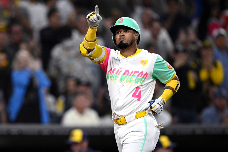Jun 21, 2024; San Diego, California, USA; San Diego Padres first baseman Luis Arraez (4) rounds the bases after hitting a two-run home run against the Milwaukee Brewers during the fifth inning at Petco Park. Mandatory Credit: Orlando Ramirez-USA TODAY Sports