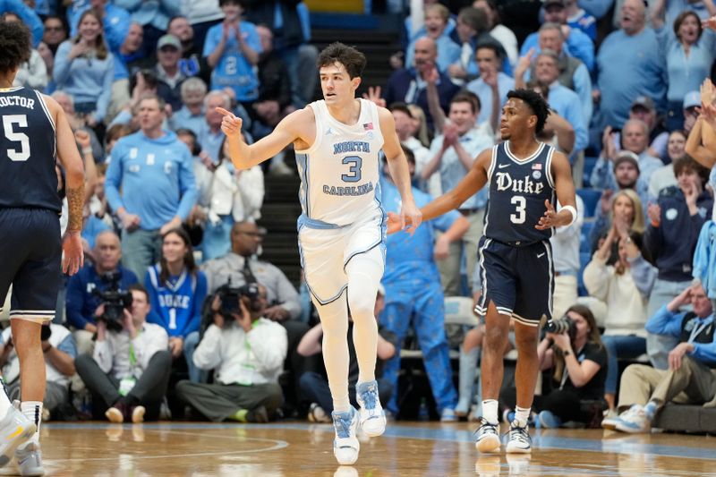 Feb 3, 2024; Chapel Hill, North Carolina, USA;  North Carolina Tar Heels guard Cormac Ryan (3) points after a made basket in the first half at Dean E. Smith Center. Mandatory Credit: Bob Donnan-USA TODAY Sports