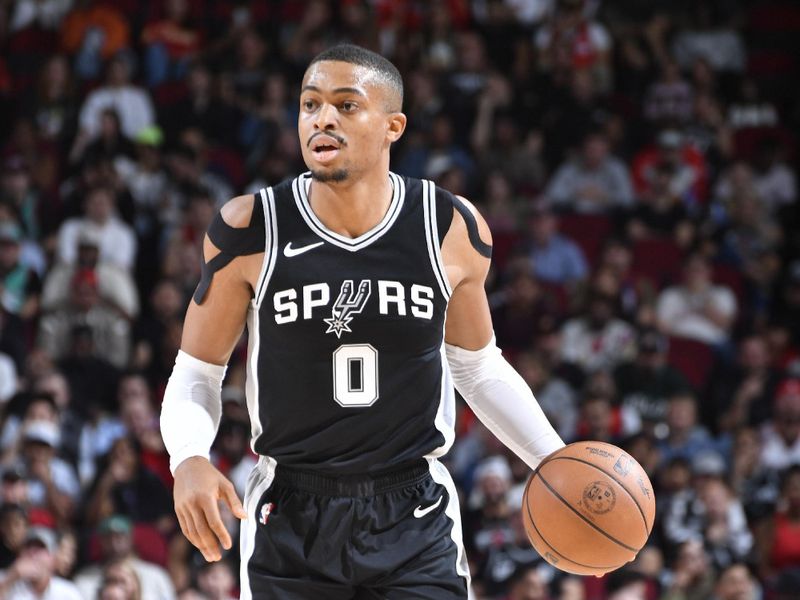 HOUSTON, TX - NOVEMBER 6:  Keldon Johnson #0 of the San Antonio Spurs dribbles the ball during the game against the Houston Rockets on November 6, 2024 at the Toyota Center in Houston, Texas. NOTE TO USER: User expressly acknowledges and agrees that, by downloading and or using this photograph, User is consenting to the terms and conditions of the Getty Images License Agreement. Mandatory Copyright Notice: Copyright 2024 NBAE (Photo by Logan Riely/NBAE via Getty Images)