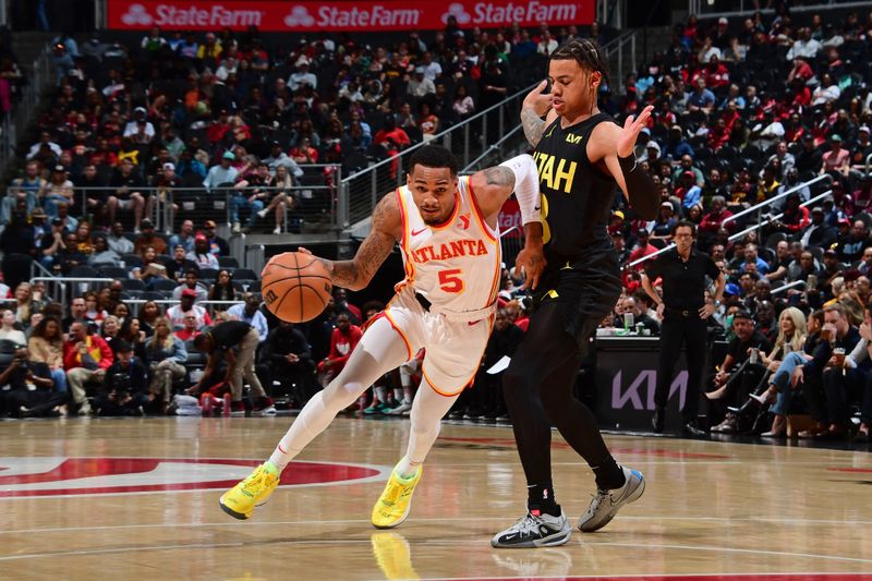 ATLANTA, GA - FEBRUARY 27: Dejounte Murray #5 of the Atlanta Hawks dribbles the ball during the game against the Utah Jazz on February 27, 2024 at State Farm Arena in Atlanta, Georgia.  NOTE TO USER: User expressly acknowledges and agrees that, by downloading and/or using this Photograph, user is consenting to the terms and conditions of the Getty Images License Agreement. Mandatory Copyright Notice: Copyright 2024 NBAE (Photo by Scott Cunningham/NBAE via Getty Images)