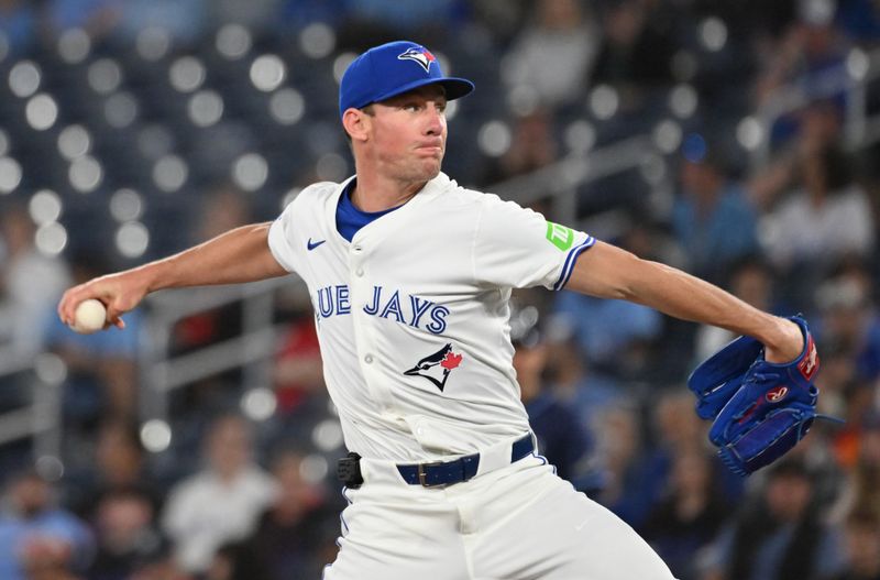 May 14, 2025; Toronto, Ontario, CAN;  Toronto Blue Jays starting pitcher Chris Bassitt (40) delivers a pitch against the Tampa Bay Rays in the first inning at Rogers Centre. Mandatory Credit: Dan Hamilton-Imagn Images