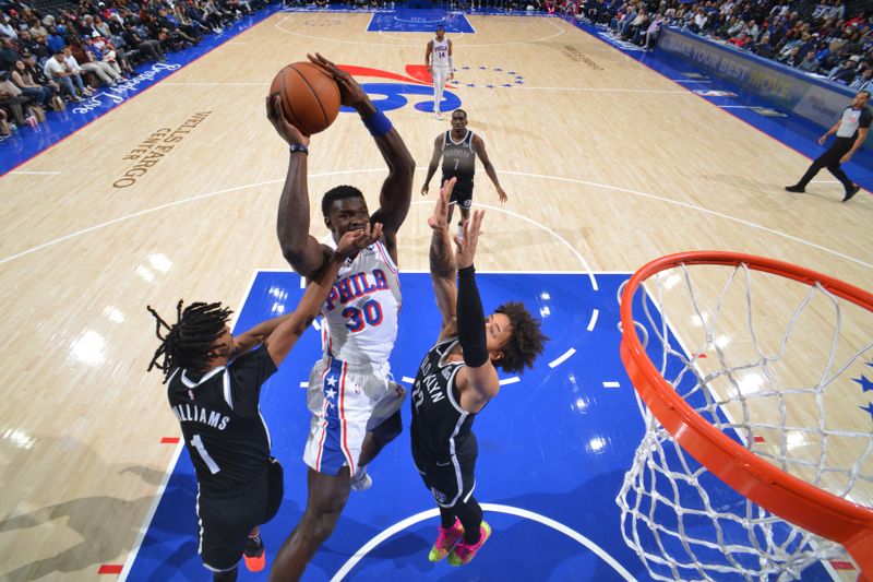 PHILADELPHIA, PA - OCTOBER 16: Adem Bona #30 of the Philadelphia 76ers drives to the basket during the game against the Brooklyn Nets during a NBA preseason game on October 16, 2024 at the Wells Fargo Center in Philadelphia, Pennsylvania NOTE TO USER: User expressly acknowledges and agrees that, by downloading and/or using this Photograph, user is consenting to the terms and conditions of the Getty Images License Agreement. Mandatory Copyright Notice: Copyright 2024 NBAE (Photo by Jesse D. Garrabrant/NBAE via Getty Images)