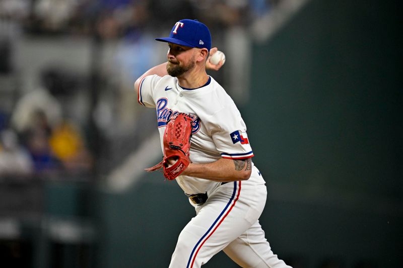 Aug 21, 2024; Arlington, Texas, USA; Texas Rangers relief pitcher Kirby Yates (39) pitches against the Pittsburgh Pirates during the ninth inning at Globe Life Field. Mandatory Credit: Jerome Miron-USA TODAY Sports