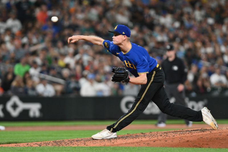 Aug 11, 2023; Seattle, Washington, USA; Seattle Mariners relief pitcher Ryder Ryan (77) pitches to the Baltimore Orioles during the eighth inning at T-Mobile Park. Mandatory Credit: Steven Bisig-USA TODAY Sports