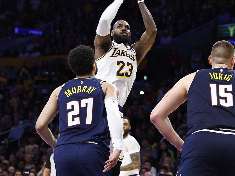 LOS ANGELES, CALIFORNIA - APRIL 27:  LeBron James #23 of the Los Angeles Lakers takes a shot against the Denver Nuggets in the second half during game four of the Western Conference First Round Playoffs at Crypto.com Arena on April 27, 2024 in Los Angeles, California.  NOTE TO USER: User expressly acknowledges and agrees that, by downloading and/or using this photograph, user is consenting to the terms and conditions of the Getty Images License Agreement. (Photo by Ronald Martinez/Getty Images)