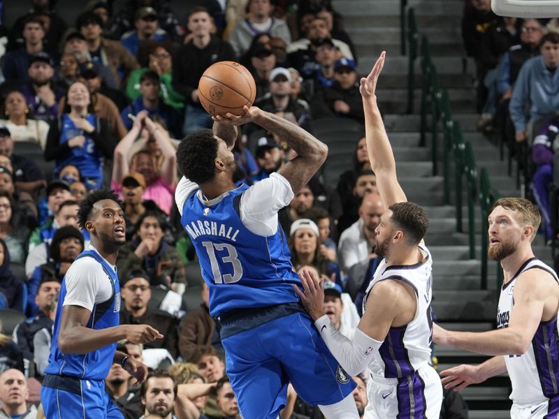 DALLAS, TX - FEBRUARY 10: Naji Marshall #13 of the Dallas Mavericks shoots the ball during the game against the Sacramento Kings on February 10, 2025 at American Airlines Center in Dallas, Texas. NOTE TO USER: User expressly acknowledges and agrees that, by downloading and or using this photograph, User is consenting to the terms and conditions of the Getty Images License Agreement. Mandatory Copyright Notice: Copyright 2025 NBAE (Photo by Glenn James/NBAE via Getty Images)