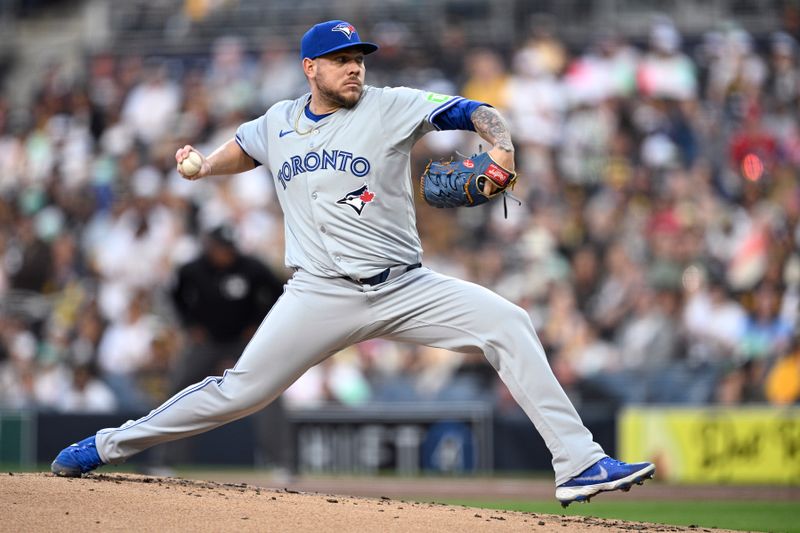Apr 19, 2024; San Diego, California, USA; Toronto Blue Jays starting pitcher Yariel Rodriguez (29) throws a pitch against the San Diego Padres during the first inning at Petco Park. Mandatory Credit: Orlando Ramirez-USA TODAY Sports 