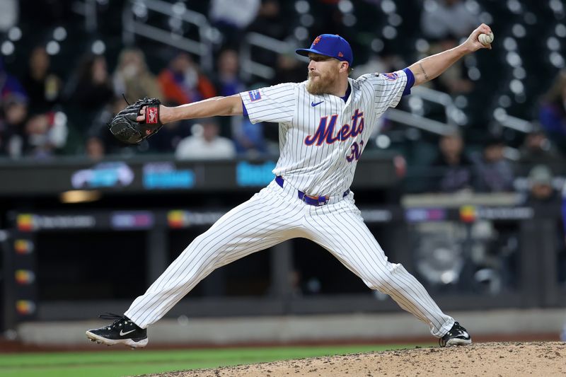 Apr 12, 2024; New York City, New York, USA; New York Mets pitcher Jake Diekman (30) pitches against the Kansas City Royals during the sixth inning at Citi Field. Mandatory Credit: Brad Penner-USA TODAY Sports