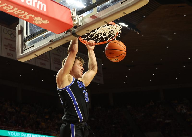 Mar 4, 2025; Ames, Iowa, USA; Brigham Young Cougars guard Dallin Hall (30) scores against the Iowa State Cyclones during the second half at James H. Hilton Coliseum. Mandatory Credit: Reese Strickland-Imagn Images