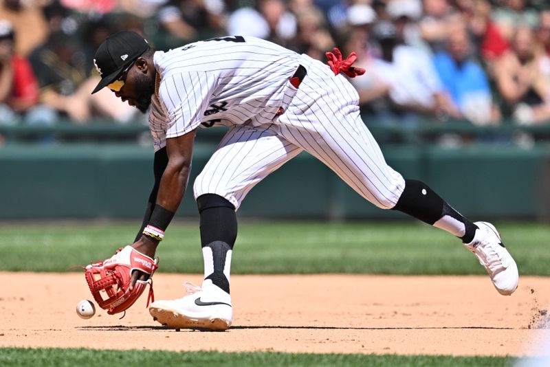 May 25, 2024; Chicago, Illinois, USA;  Chicago White Sox infielder Bryan Ramos (44) fields a ground ball in the fourth inning against the Baltimore Orioles at Guaranteed Rate Field. Mandatory Credit: Jamie Sabau-USA TODAY Sports