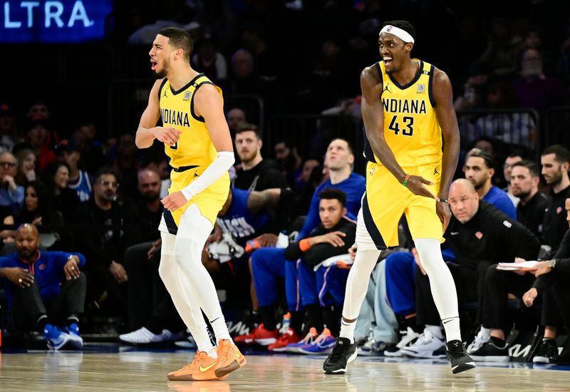 NEW YORK, NEW YORK - FEBRUARY 10:  Tyrese Haliburton #0 and Pascal Siakam #43 of the Indiana Pacers celebrate a basket against the New York Knicks during the second half at Madison Square Garden on February 10, 2024 in New York City. NOTE TO USER: User expressly acknowledges and agrees that, by downloading and or using this photograph, User is consenting to the terms and conditions of the Getty Images License Agreement. (Photo by Steven Ryan/Getty Images)