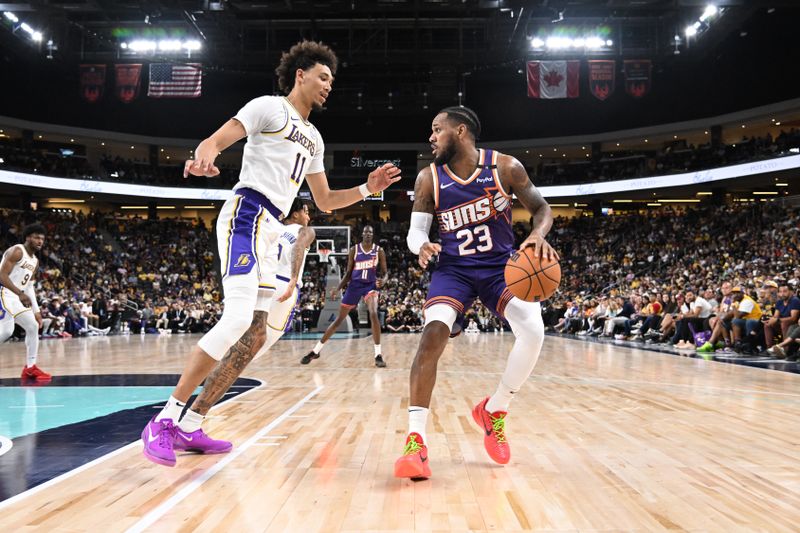 LOS ANGELES, CA - OCTOBER 6: Monte Morris #23 of the Phoenix Suns dribbles the ball during the game against the Los Angeles Lakers on October 6, 2024 at Acrisure Arena in Palm Springs, California. NOTE TO USER: User expressly acknowledges and agrees that, by downloading and/or using this Photograph, user is consenting to the terms and conditions of the Getty Images License Agreement. Mandatory Copyright Notice: Copyright 2024 NBAE (Photo by Adam Pantozzi/NBAE via Getty Images)