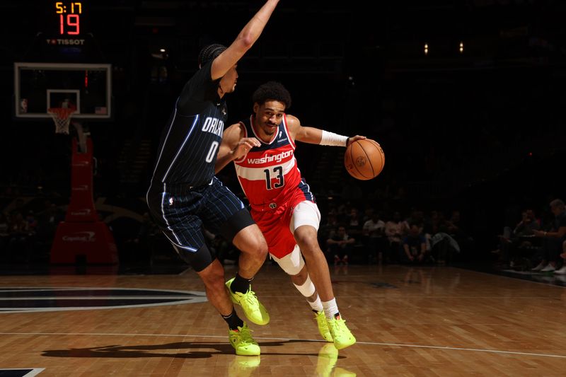 WASHINGTON, DC -? MARCH 6:  Jordan Poole #13 of the Washington Wizards goes to the basket during the game on March 6, 2024 at Capital One Arena in Washington, DC. NOTE TO USER: User expressly acknowledges and agrees that, by downloading and or using this Photograph, user is consenting to the terms and conditions of the Getty Images License Agreement. Mandatory Copyright Notice: Copyright 2024 NBAE (Photo by Stephen Gosling/NBAE via Getty Images)