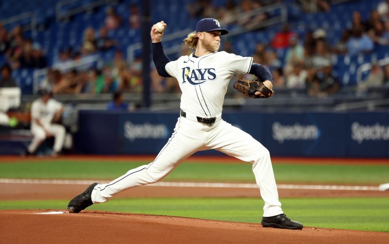 Sep 17, 2024; St. Petersburg, Florida, USA;  Tampa Bay Rays pitcher Shane Baz (11) throws a pitch against the Boston Red Sox during the first inning at Tropicana Field. Mandatory Credit: Kim Klement Neitzel-Imagn Images