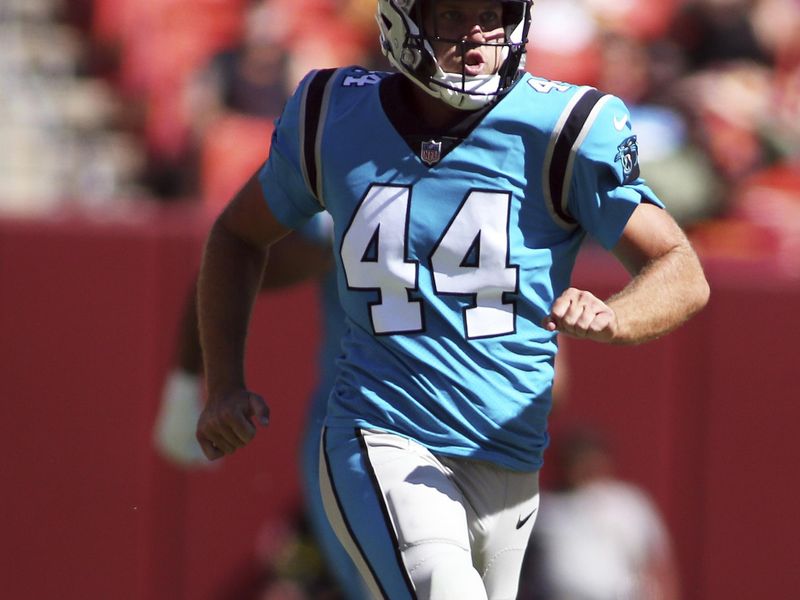 Carolina Panthers long snapper J.J. Jansen (44) runs during an NFL football game against the Washington Commanders, Saturday, Aug. 13, 2022 in Landover. (AP Photo/Daniel Kucin Jr.)