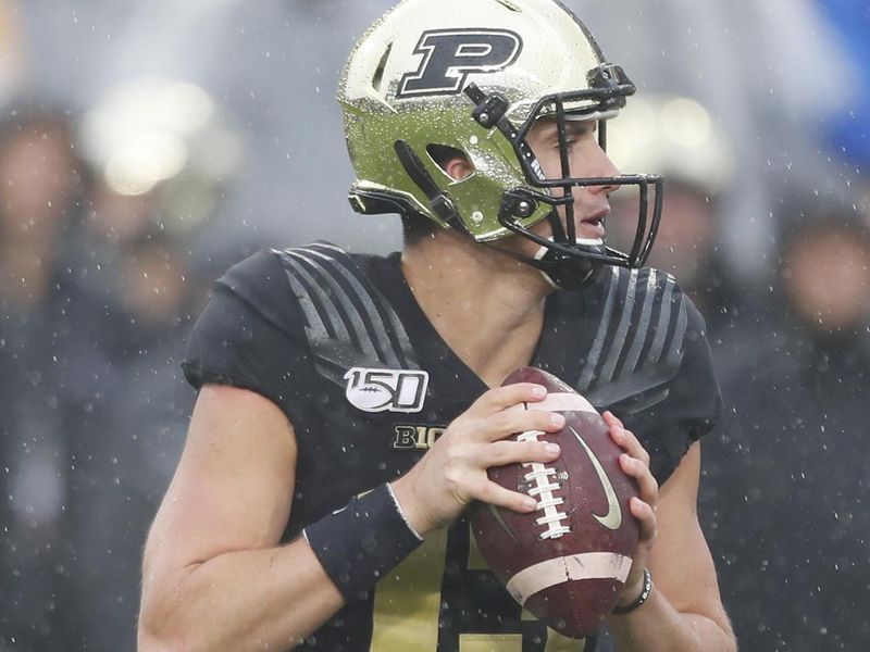 Oct 26, 2019; West Lafayette, IN, USA; Purdue Boilermakers quarterback Jack Plummer (13) throws a pass against the Illinois Fighting Illini during the first quarter at Ross-Ade Stadium. Mandatory Credit: Brian Spurlock-USA TODAY Sports