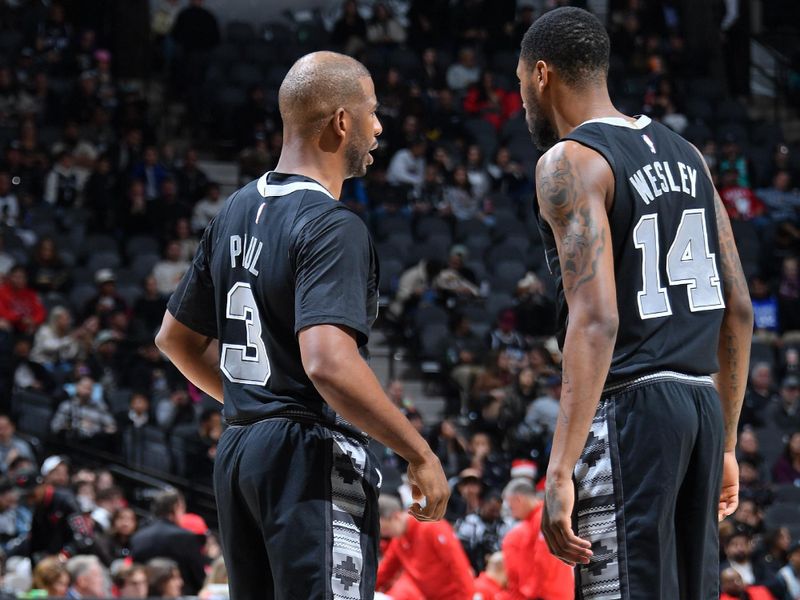 SAN ANTONIO, TX - DECEMBER 5: Chris Paul #3 and Blake Wesley #14 of the San Antonio Spurs looks on during the game against the Chicago Bulls on December 5, 2024 at the Frost Bank Center in San Antonio, Texas. NOTE TO USER: User expressly acknowledges and agrees that, by downloading and or using this photograph, user is consenting to the terms and conditions of the Getty Images License Agreement. Mandatory Copyright Notice: Copyright 2024 NBAE (Photos by Michael Gonzales/NBAE via Getty Images)