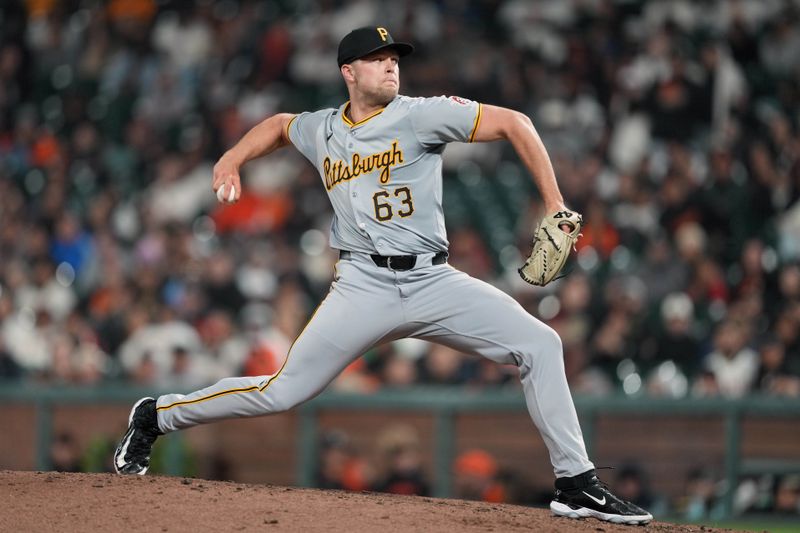 Apr 27, 2024; San Francisco, California, USA; Pittsburgh Pirates pitcher Hunter Stratton (63) throws a pitch against the San Francisco Giants during the ninth inning at Oracle Park. Mandatory Credit: Darren Yamashita-USA TODAY Sports