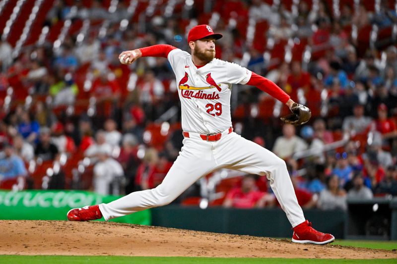 May 6, 2024; St. Louis, Missouri, USA;  St. Louis Cardinals relief pitcher Nick Robertson (29) pitches against the New York Mets during the ninth inning at Busch Stadium. Mandatory Credit: Jeff Curry-USA TODAY Sports