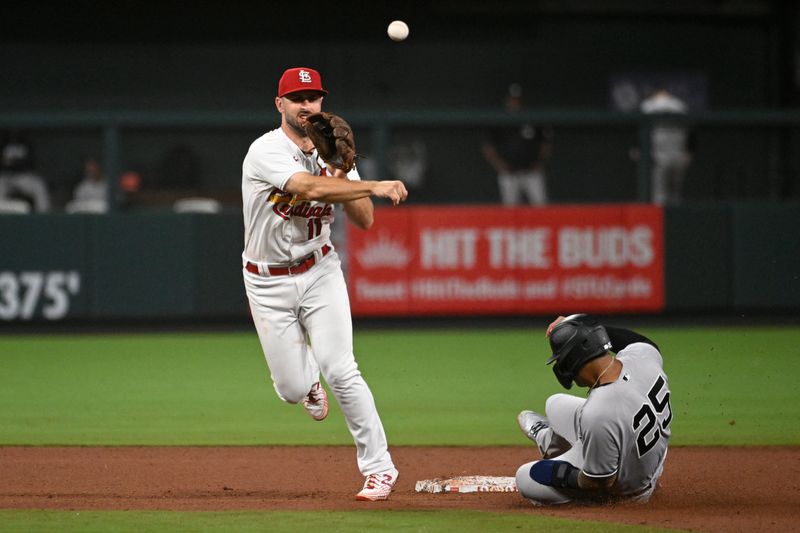 Jul 1, 2023; St. Louis, Missouri, USA; New York Yankees second baseman Gleyber Torres (25) is out at second as St. Louis Cardinals shortstop Paul DeJong (11) turns a double play in the eighth inning in game two of a double header at Busch Stadium. Mandatory Credit: Joe Puetz-USA TODAY Sports