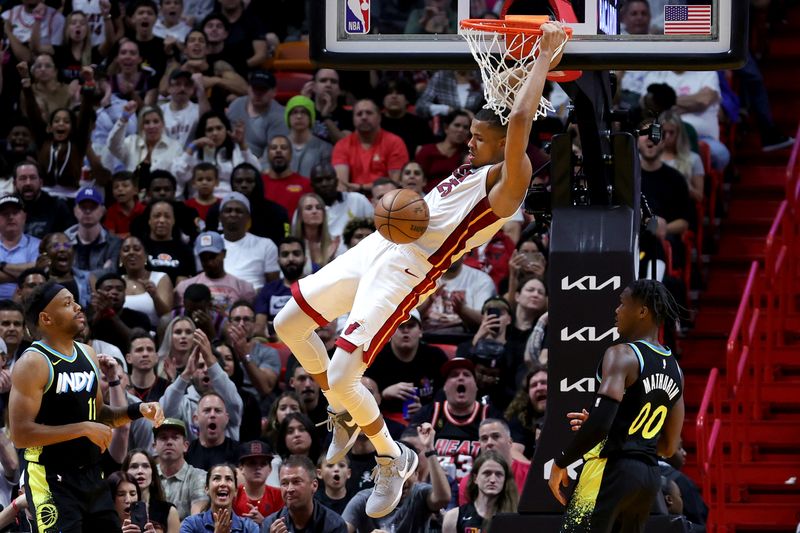 MIAMI, FLORIDA - DECEMBER 02: Orlando Robinson #25 of the Miami Heat dribbles the ball against the Indiana Pacers during the fourth quarter of the game at Kaseya Center on December 02, 2023 in Miami, Florida. NOTE TO USER: User expressly acknowledges and agrees that, by downloading and or using this photograph, User is consenting to the terms and conditions of the Getty Images License Agreement. (Photo by Megan Briggs/Getty Images)