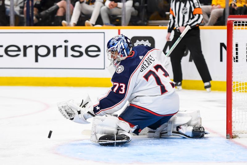 Apr 13, 2024; Nashville, Tennessee, USA; Columbus Blue Jackets goaltender Jet Greaves (73) blocks the puck against the Nashville Predators during the first period at Bridgestone Arena. Mandatory Credit: Steve Roberts-USA TODAY Sports