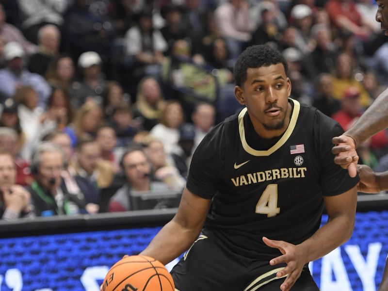 Mar 11, 2023; Nashville, TN, USA;  Vanderbilt Commodores guard Jordan Wright (4) dribbles against the Texas A&M during the first half at Bridgestone Arena. Mandatory Credit: Steve Roberts-USA TODAY Sports