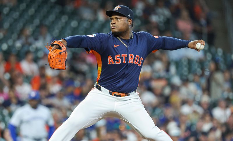 Apr 2, 2024; Houston, Texas, USA; Houston Astros starting pitcher Framber Valdez (59) delivers a pitch during the first inning against the Toronto Blue Jays at Minute Maid Park. Mandatory Credit: Troy Taormina-USA TODAY Sports