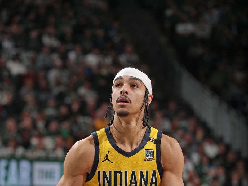 MILWAUKEE, WI - APRIL 21: Andrew Nembhard #2 of the Indiana Pacers shoots a free throw during the game against the Milwaukee Bucks during Round 1 Game 1 of the 2024 NBA Playoffs on April 21, 2024 at the Fiserv Forum Center in Milwaukee, Wisconsin. NOTE TO USER: User expressly acknowledges and agrees that, by downloading and or using this Photograph, user is consenting to the terms and conditions of the Getty Images License Agreement. Mandatory Copyright Notice: Copyright 2024 NBAE (Photo by Gary Dineen/NBAE via Getty Images).