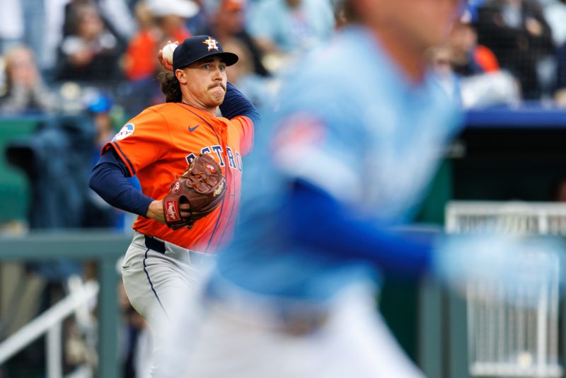 Apr 27, 2025; Kansas City, Missouri, USA; Houston Astros pitcher Bryan King (74) throws to first base during the seventh inning against the Kansas City Royals at Kauffman Stadium. Mandatory Credit: William Purnell-Imagn Images