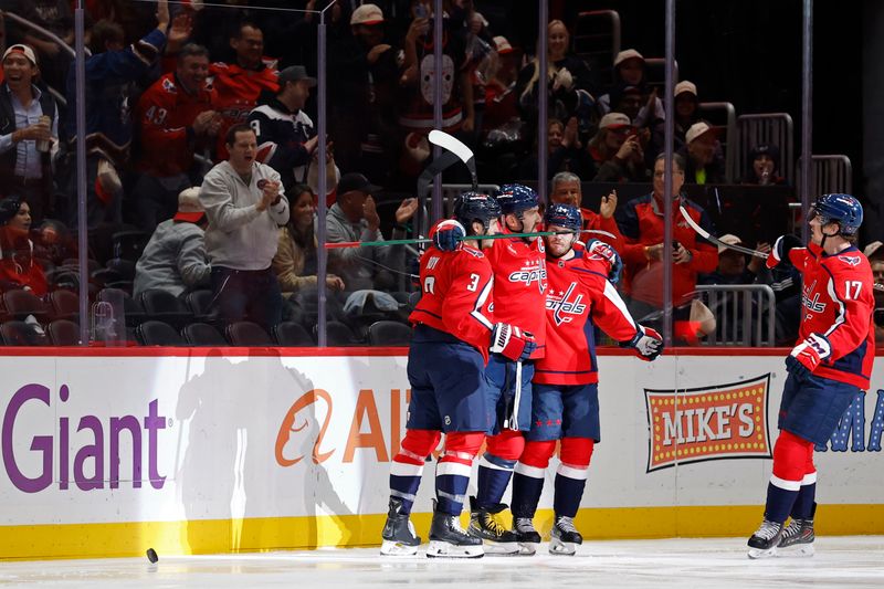 Nov 17, 2025; Washington, District of Columbia, USA; Washington Capitals left wing Alex Ovechkin (8) celebrates with teammates after scoring a goal against the Los Angeles Kings during the second period at Capital One Arena. Mandatory Credit: Geoff Burke-Imagn Images