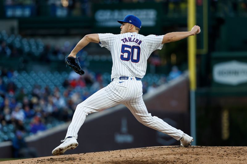 Apr 24, 2024; Chicago, Illinois, USA; Chicago Cubs starting pitcher Jameson Taillon (50) delivers a pitch against the Houston Astros during the second inning at Wrigley Field. Mandatory Credit: Kamil Krzaczynski-USA TODAY Sports