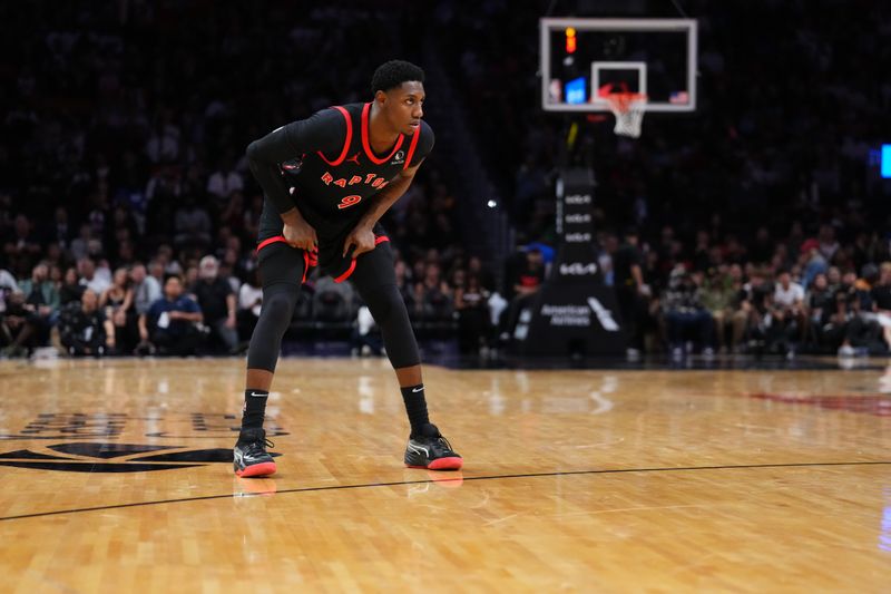 MIAMI, FLORIDA - DECEMBER 12: RJ Barrett #9 of the Toronto Raptors looks on against the Miami Heat during the third quarter at Kaseya Center on December 12, 2024 in Miami, Florida. NOTE TO USER: User expressly acknowledges and agrees that, by downloading and or using this Photograph, user is consenting to the terms and conditions of the Getty Images License Agreement. (Photo by Rich Storry/Getty Images)