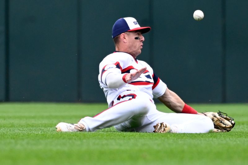 Jun 11, 2023; Chicago, Illinois, USA;   Chicago White Sox second baseman Romy Gonzalez (15) can   t make the play on a ball hit by Miami Marlins center fielder Jonathan Davis (49) at during the seventh inning Guaranteed Rate Field. Mandatory Credit: Matt Marton-USA TODAY Sports