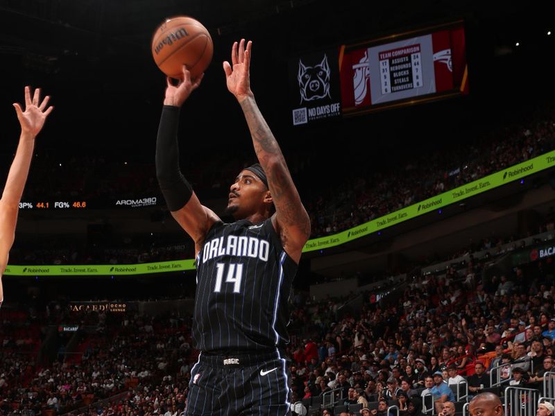 MIAMI, FL - OCTOBER 23: Gary Harris #14 of the Orlando Magic shoots a three point basket during the game against the Miami Heat on October 23, 2024 at Kaseya Center in Miami, Florida. NOTE TO USER: User expressly acknowledges and agrees that, by downloading and or using this Photograph, user is consenting to the terms and conditions of the Getty Images License Agreement. Mandatory Copyright Notice: Copyright 2024 NBAE (Photo by Issac Baldizon/NBAE via Getty Images)