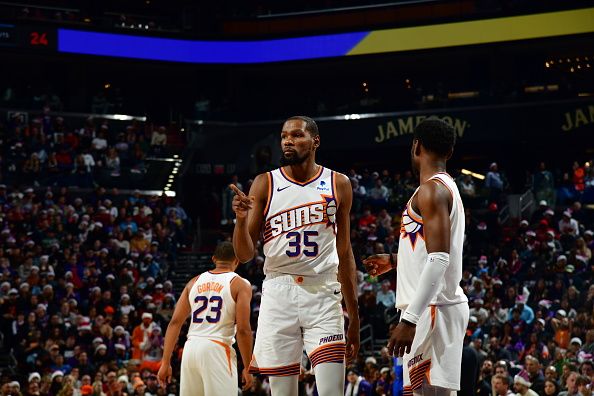 PHOENIX, AZ - DECEMBER 25: Kevin Durant #35 of the Phoenix Suns looks on during the game against the Dallas Mavericks on December 25, 2023 at Footprint Center in Phoenix, Arizona. NOTE TO USER: User expressly acknowledges and agrees that, by downloading and or using this photograph, user is consenting to the terms and conditions of the Getty Images License Agreement. Mandatory Copyright Notice: Copyright 2023 NBAE (Photo by Kate Frese/NBAE via Getty Images)