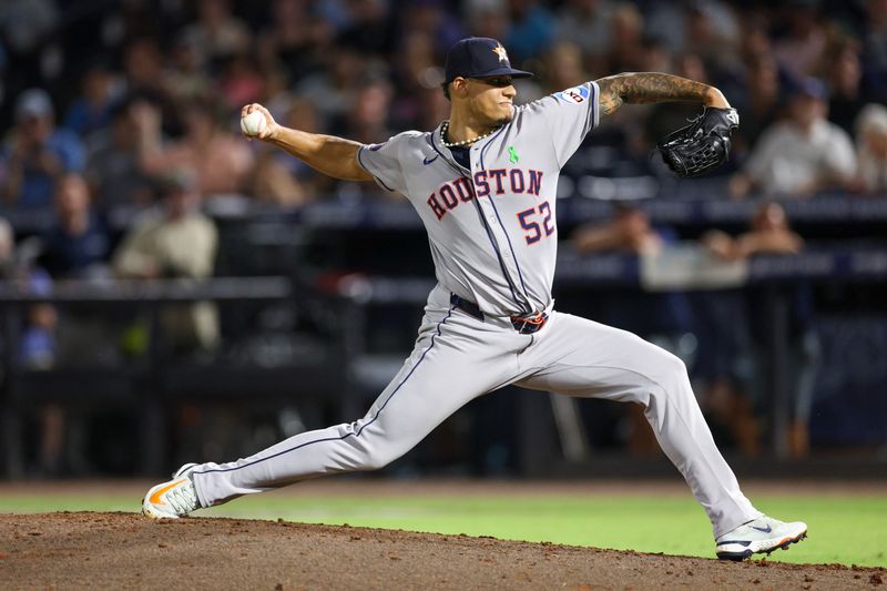 May 19, 2025; Tampa, Florida, USA; Houston Astros pitcher Bryan Abreu (52) throws a pitch against the Tampa Bay Rays in the seventh inning at George M. Steinbrenner Field. Mandatory Credit: Nathan Ray Seebeck-Imagn Images