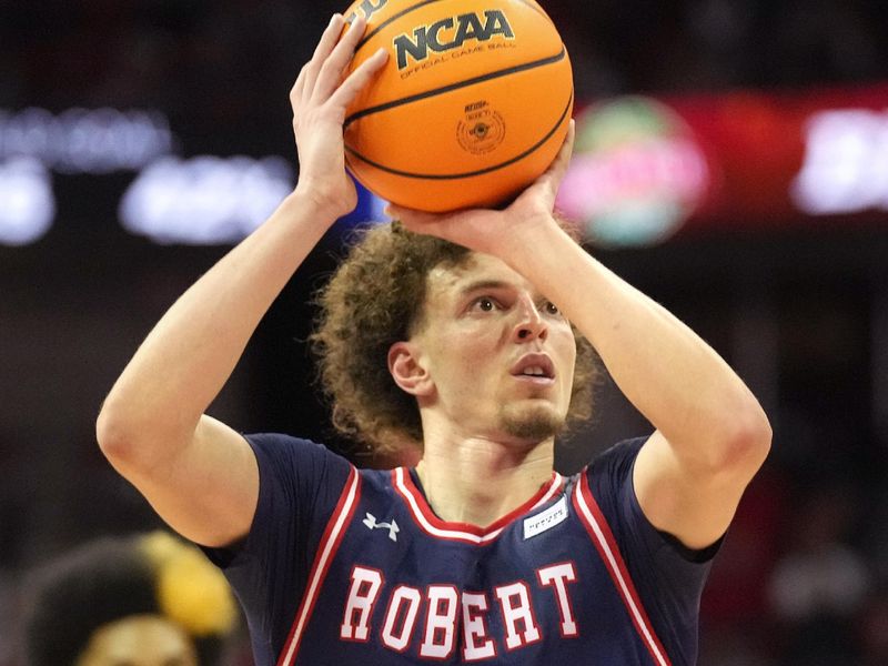 Nov 17, 2023; Madison, Wisconsin, USA; Robert Morris Colonials guard TJ Wainwright (5) shoots a free throw during the first half against the Wisconsin Badgers at the Kohl Center. Mandatory Credit: Kayla Wolf-USA TODAY Sports