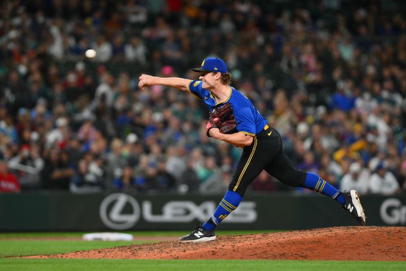 Sep 14, 2024; Seattle, Washington, USA; Seattle Mariners relief pitcher Troy Taylor (59) pitches to the Texas Rangers during the seventh inning at T-Mobile Park. Mandatory Credit: Steven Bisig-Imagn Images