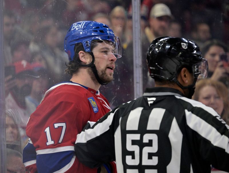 Nov 15, 2025; Montreal, Quebec, CAN; Montreal Canadiens forward Josh Anderson (17) exchanges words with Boston Bruins players behind linesman Shandor Alphonso (52) during the first period at the Bell Centre. Mandatory Credit: Eric Bolte-Imagn Images