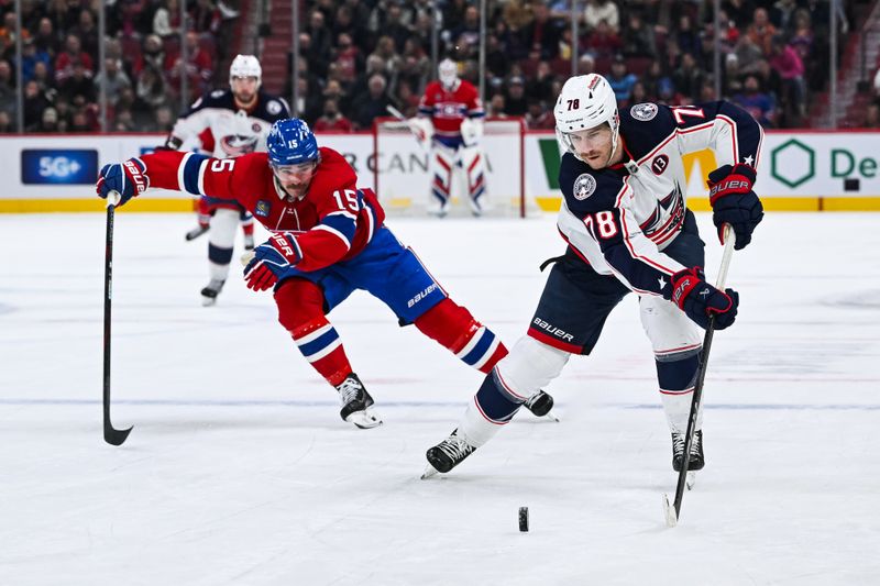 Nov 16, 2024; Montreal, Quebec, CAN; Columbus Blue Jackets defenseman Damon Severson (78) defends the puck against Montreal Canadiens center Alex Newhook (15)  during the second period at Bell Centre. Mandatory Credit: David Kirouac-Imagn Images